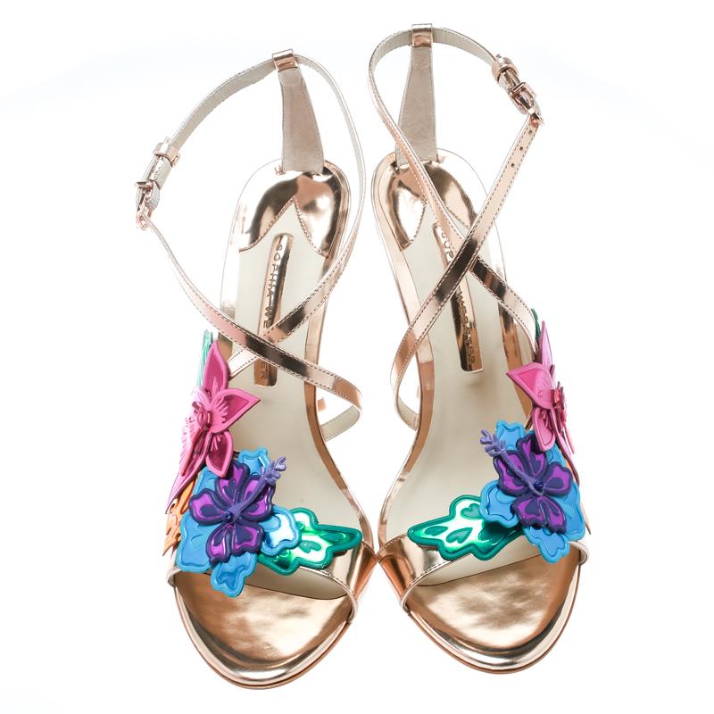 Experience the best of fashion in these sandals from the house of Sophia Webster. They are designed from patent leather and decorated with flowers singing in vibrant colours. Lined with leather, they are crafted to offer you beauty and maximum