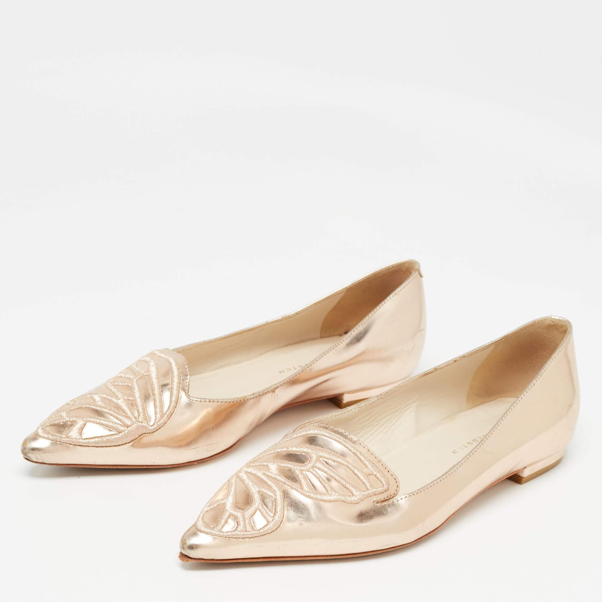 Known for her whimsical designs, Sophia Webster is a name known well with shoe lovers. These Bibi ballet flats are crafted from rose gold leather and designed with pointed toes and beautiful butterfly detailing on the vamps. The flats are
