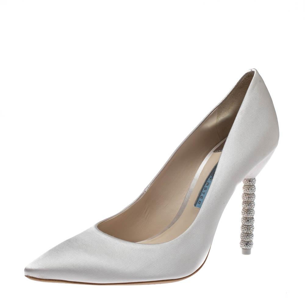 Comfort coupled with fashion creates wonders and these pumps from Sophia Webster are a true example of that. These white ivory pumps are crafted from satin and feature pointed toes. They stand tall on crystal-embellished 11.5 cm heels and come