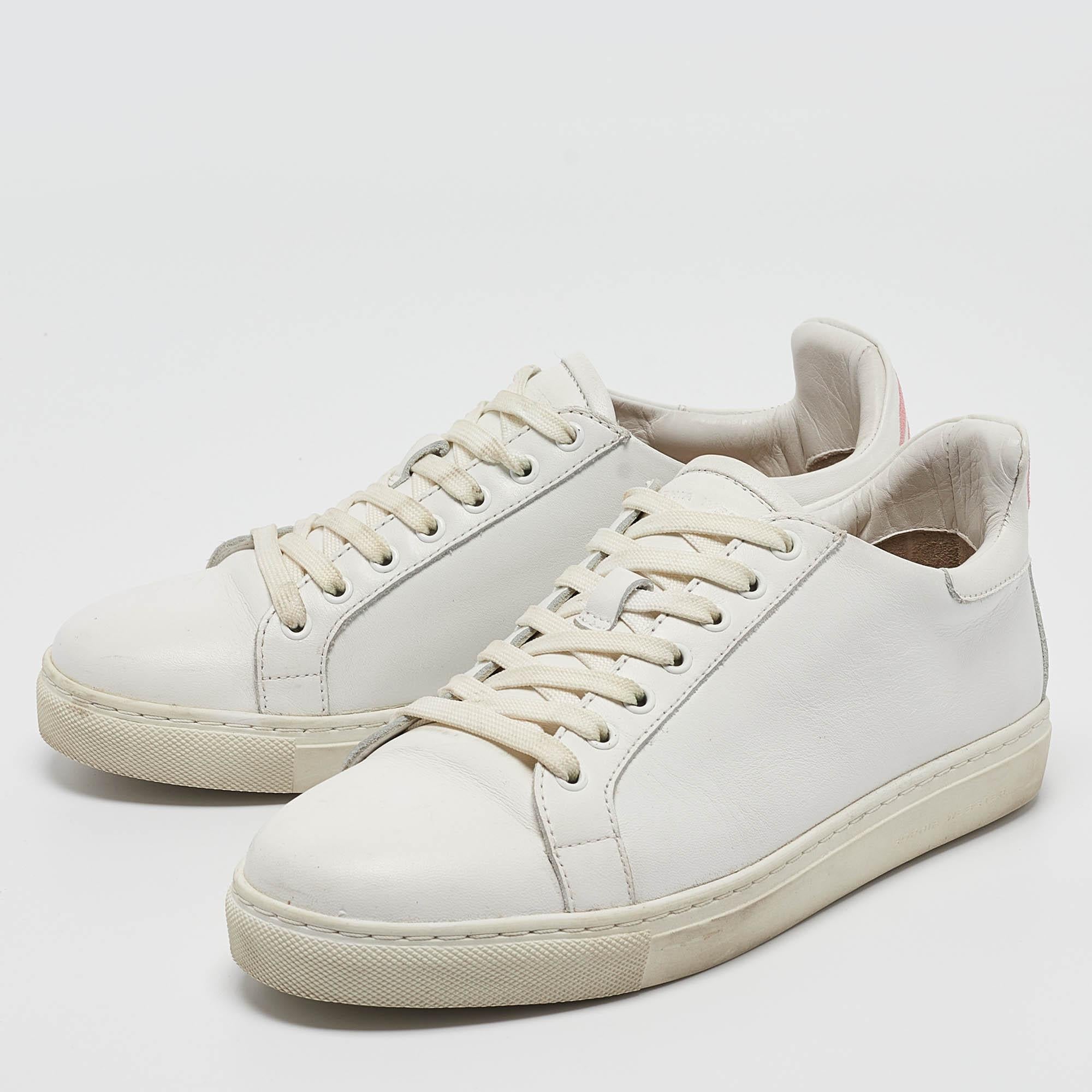 Coming in a classic silhouette these designer sneakers are a seamless combination of luxury comfort and style. These sneakers are finished with signature details and comfortable insoles.