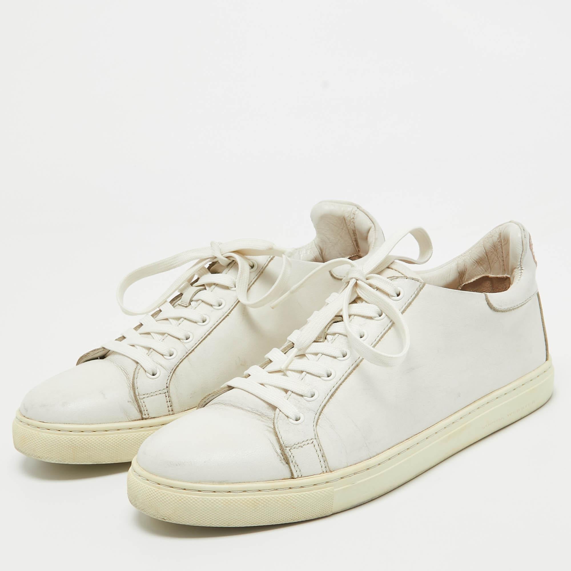 Coming in a classic silhouette these designer sneakers are a seamless combination of luxury comfort and style. These sneakers are finished with signature details and comfortable insoles.