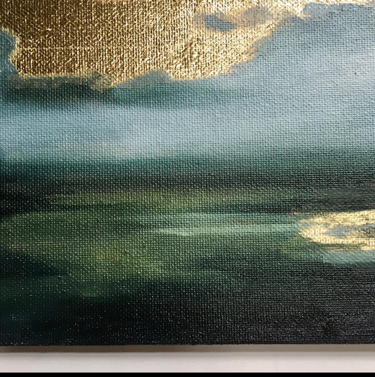 A gold-leaf landscape painting by Sophie Berger. This original oil painting on canvas board has the depth and moodiness of a Dartmoor sky as well as the vivid sunshine hiding beneath the clouds. This is captured by the iridescent glory of the gold