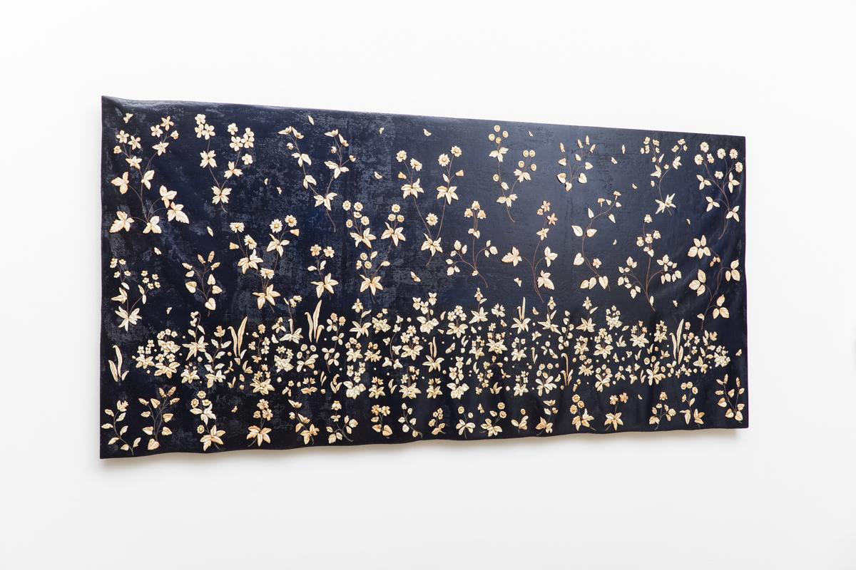 Float, a large carved wallhanging, draws inspiration from the unicorn tapestries in the collection of the Victoria and Albert Museum. Created in the 1500th century, the tapestries known as millefleurs (meaning a thousand flowers) were woven in many