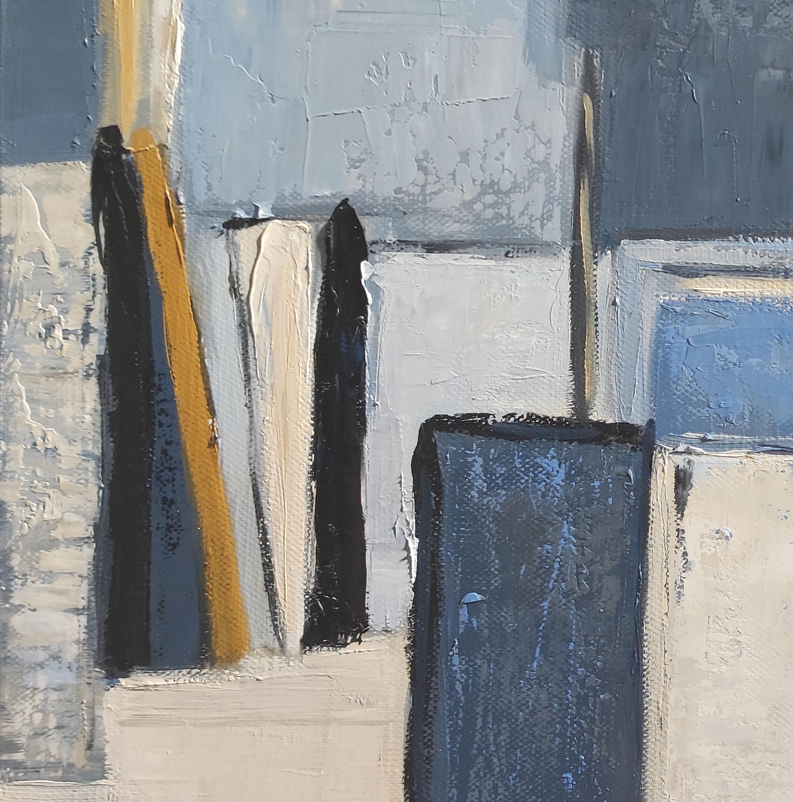 Artist's studio in a dominant blue with a texture very present and colors that vibrate with the succession of layers on the canvas. Cubic shapes, parallel and perpendicular lines, without forgetting colors, direct the viewer's gaze, and ultimately