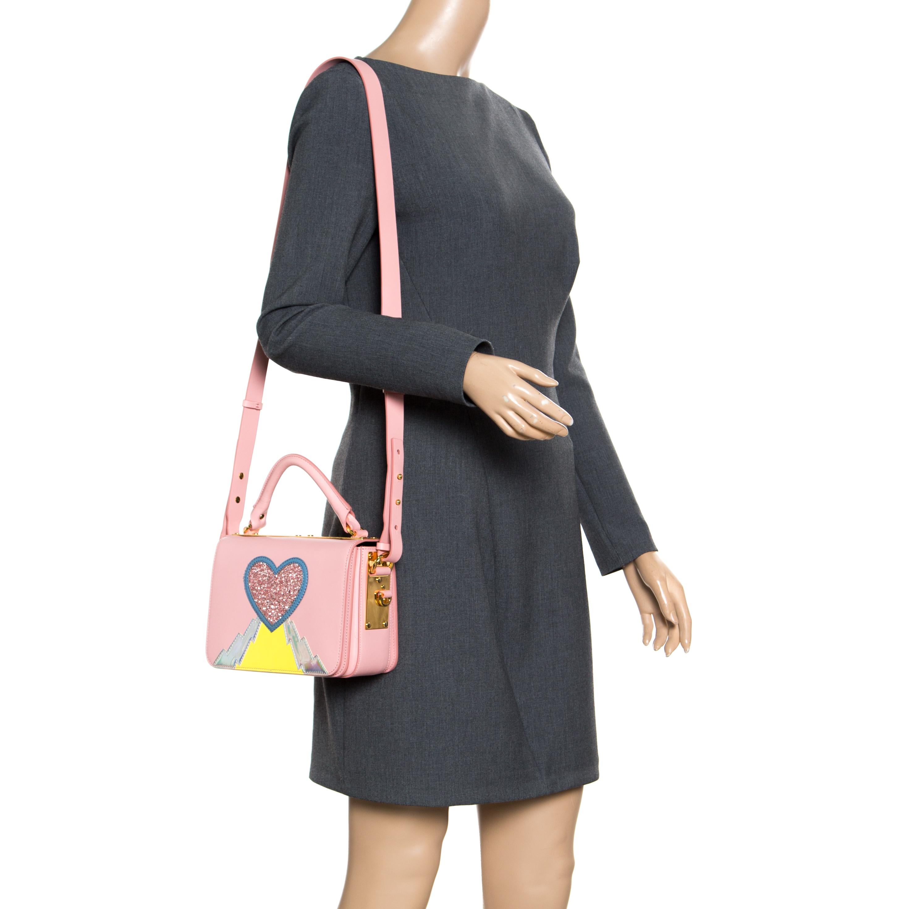 Handbags are more than just instruments to carry one's essentials. They tell a woman's sense of style and the better the bag, the more confidence she gets when she holds it. Sophie Hulme brings you one such fabulous bag meticulously made from pink