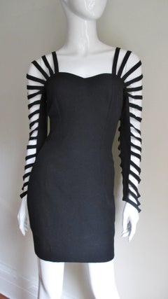 Sophie Sitbon - Vestito con maniche a gabbia e schiena dettagliata