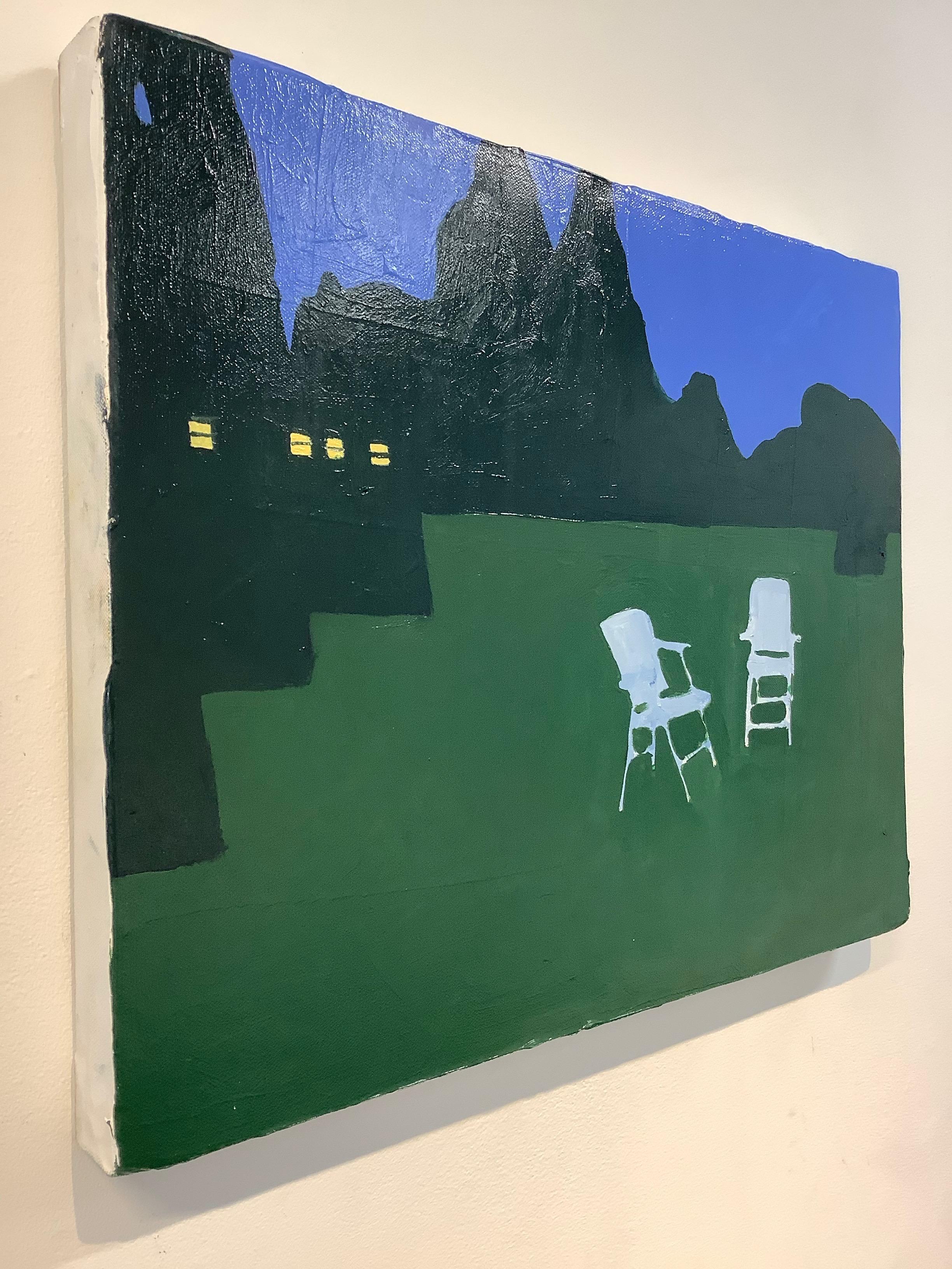 In this landscape painting by Sophie Treppendahl, a cabin with white lawn chairs in the garden is peaceful and quiet against a dense forest with dark green pine trees in the background. Within the windows of the blue cabin, soft light glows from the