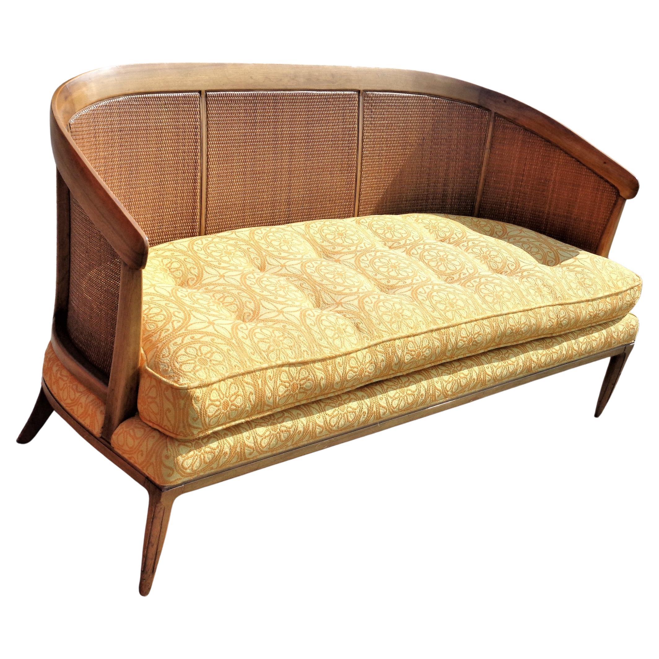  Sophisticate by Tomlinson rare cane back settee designed by John Lubberts and Lambert Mulder in all original vintage condition w/ beautiful glowing color and  button tufted upholstered loose seat cushion. All labels present ( img.8, 9 ) circa