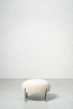 Sophisticate Hocker - Chromstahlrohrbeine mit Boucle-Polsterung