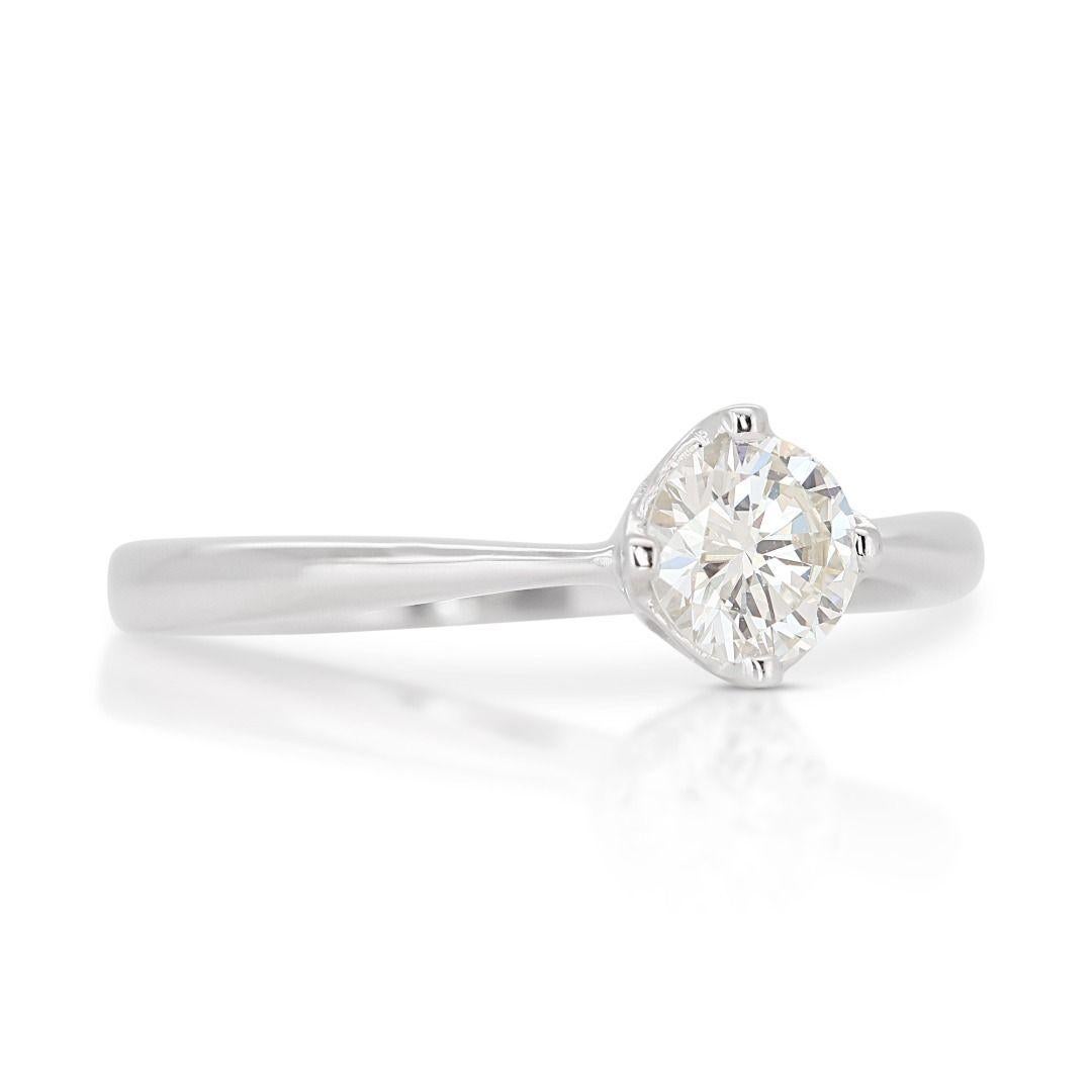 Round Cut Sophisticated 0.50ct Solitaire Diamond Ring set in 18K White Gold For Sale