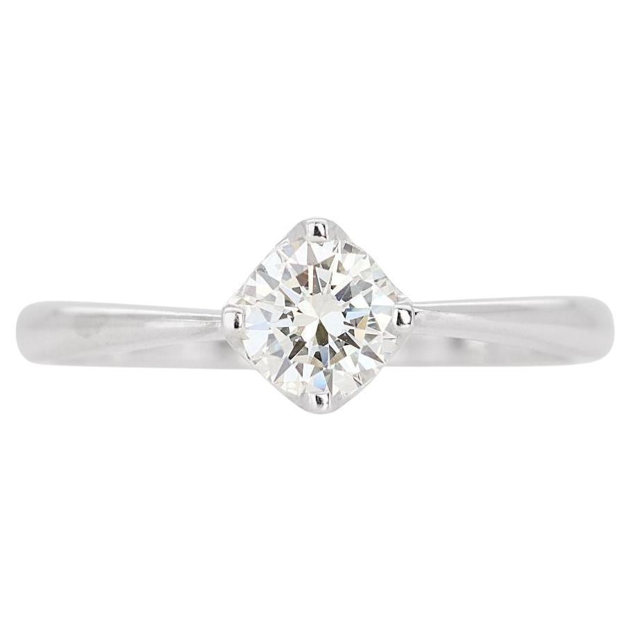Sophisticated 0.50ct Solitaire Diamond Ring set in 18K White Gold For Sale