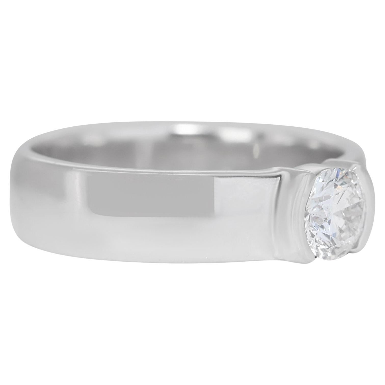 Sophisticated 0.70ct Diamond Solitaire Ring in 18k White Gold - GIA Certified

Celebrate the essence of elegance with this classic solitaire diamond ring, masterfully crafted from 18k white gold. Centered with a luminous 0.70-carat round diamond.