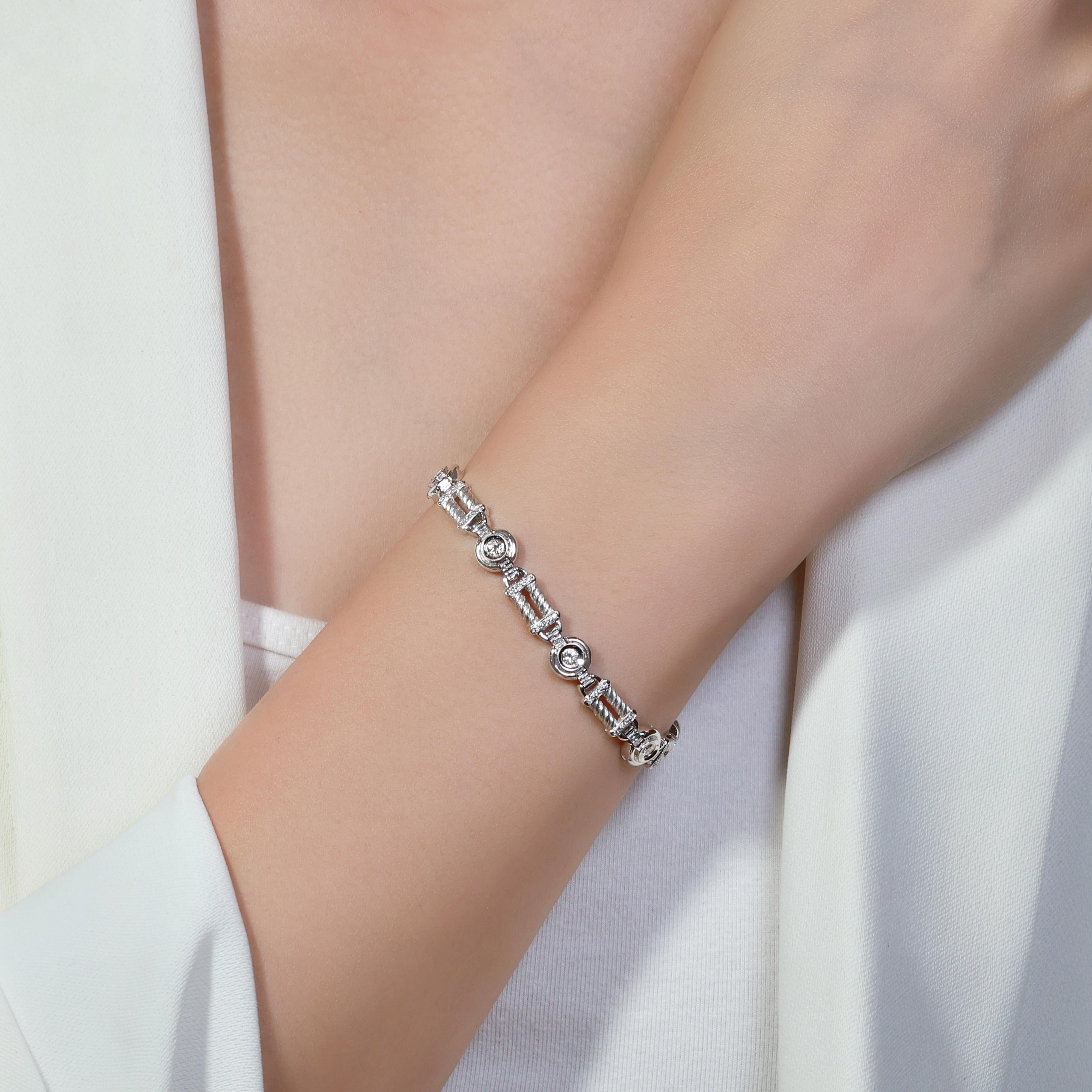 This exquisite piece of jewelry is crafted from 18K white gold, exuding a sense of luxury and sophistication. At its center, it showcases eight stunning round brilliant natural diamonds, which together weigh 0.56 carats. Graded F for color and VS