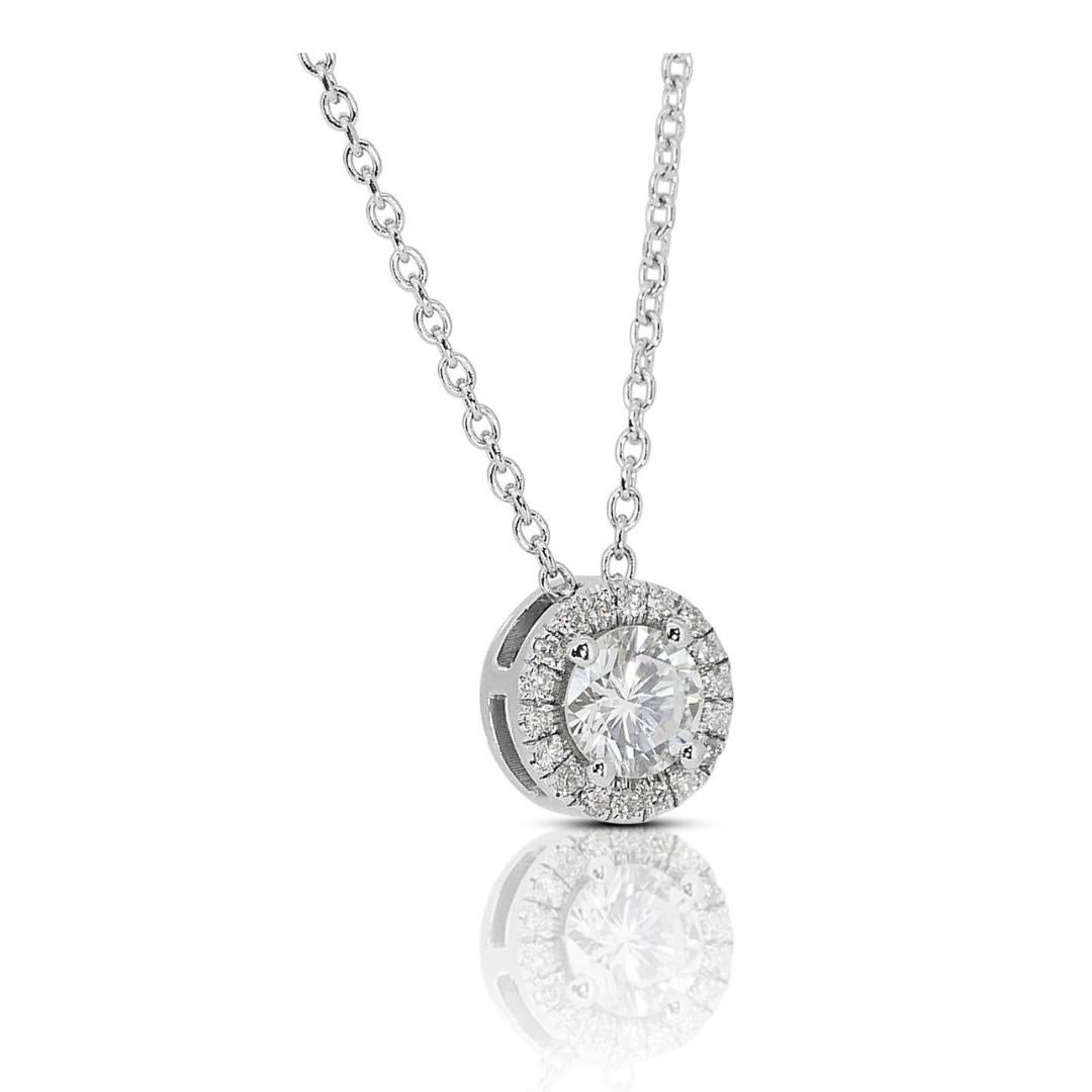 Sophisticated 1.10 ct Round Diamond Halo Necklace in 18k White Gold – GIA Certified

This stunning halo necklace, elegantly crafted in 18k white gold, features a magnificent central diamond weighing 0.90-carat. Encircling the main stone are 18