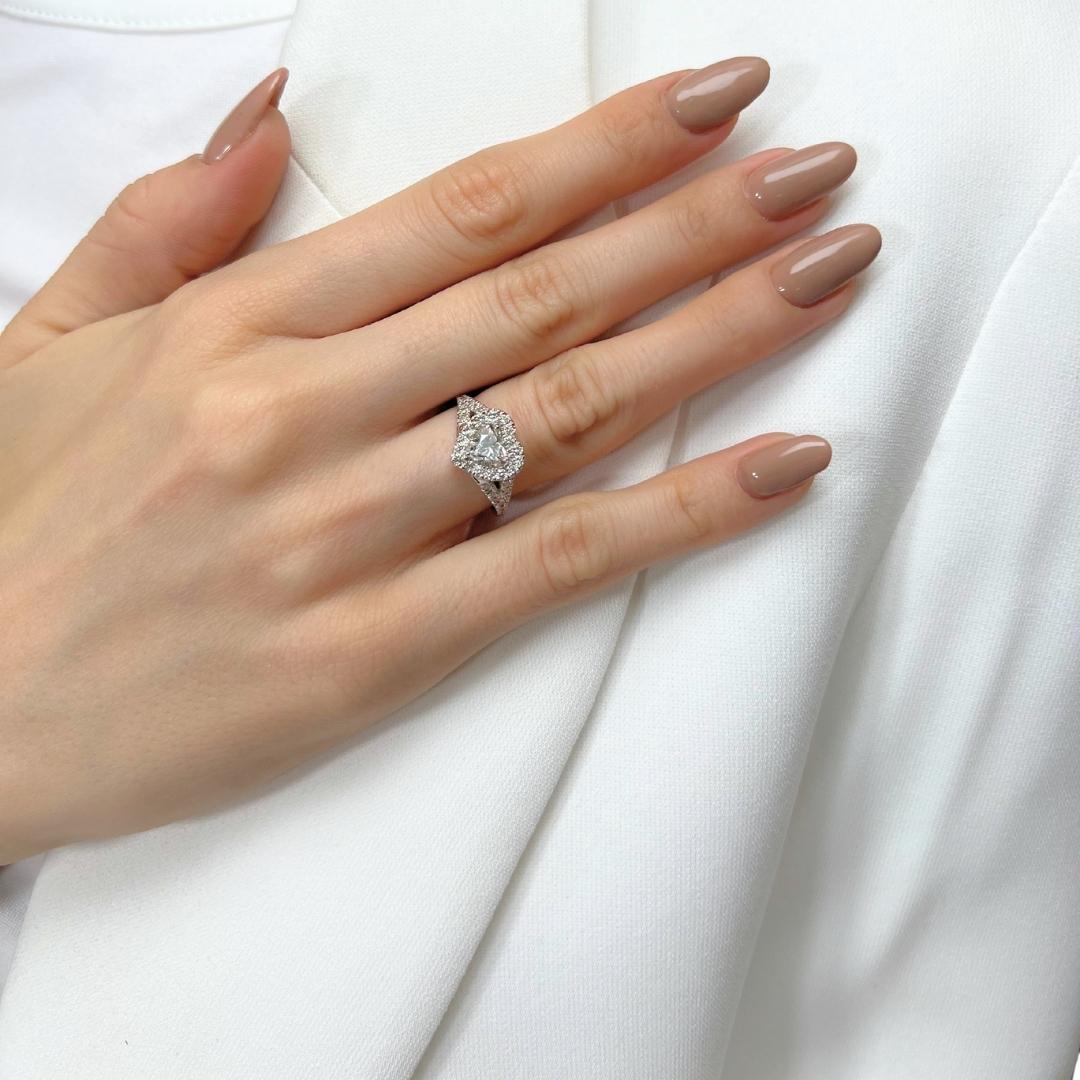 Sophisticated 1.15ct Diamonds Halo Heart-Shaped Ring in 18k White Gold - GIA Certified

This enchanting 18k white gold halo ring features a stunning 0.74-carat heart-shaped diamond radiating brilliance and purity. Enhanced by 42 round diamonds