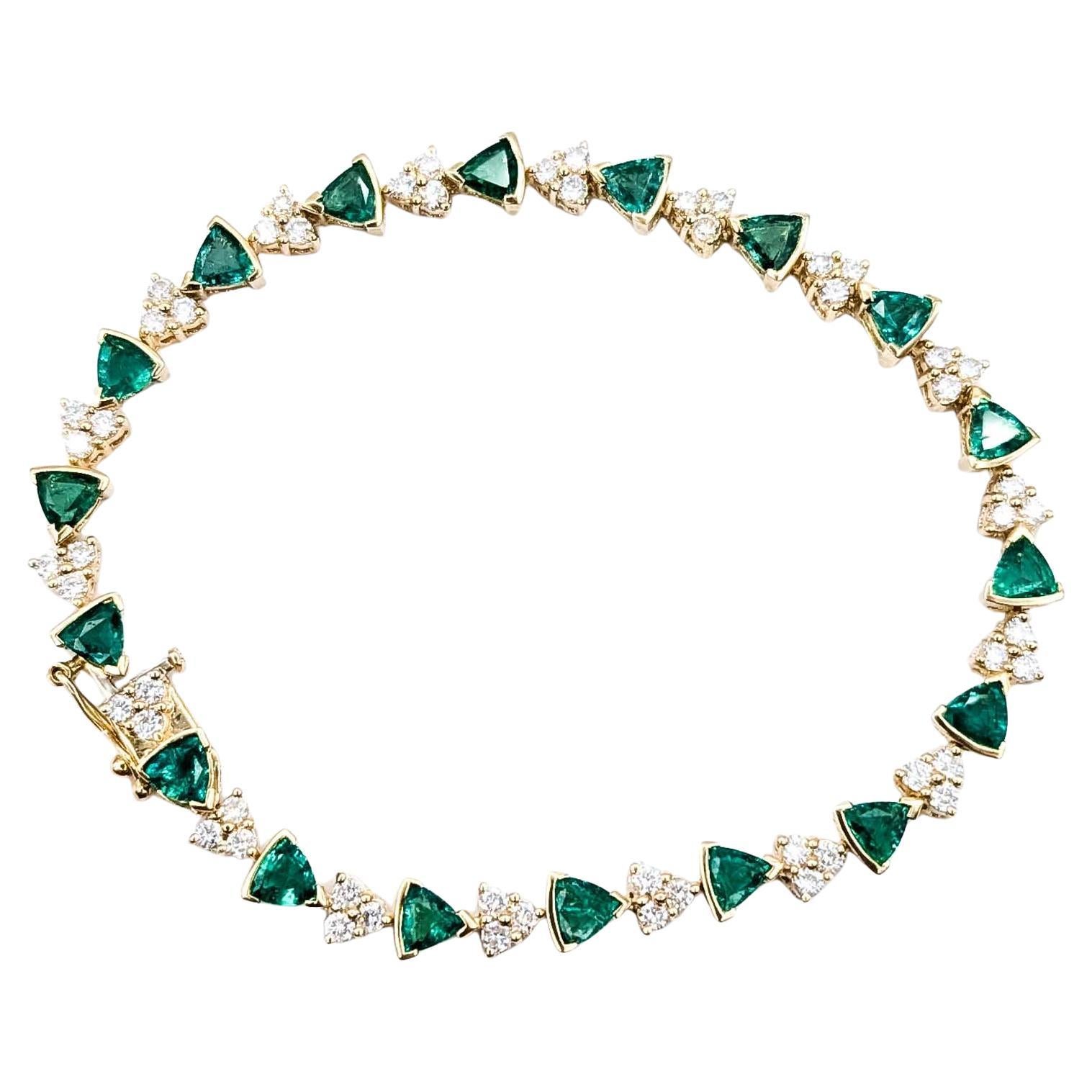 Sofisticada pulsera de esmeraldas y diamantes de oro amarillo de 14k en venta