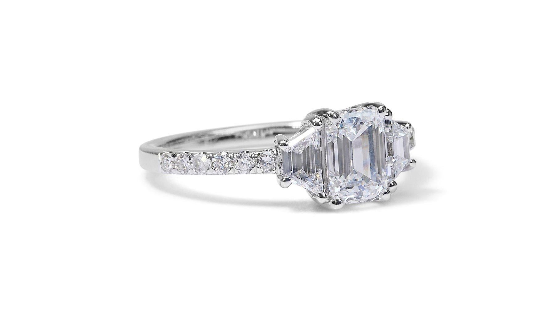Sophisticated 1.83ct Diamonds 3-Stone Ring in 18k White Gold - GIA Certified

This luxurious ring showcases a breathtaking 1.00-carat emerald-cut diamond with a flawless color grade and remarkable clarity, exuding unmatched elegance. Set in