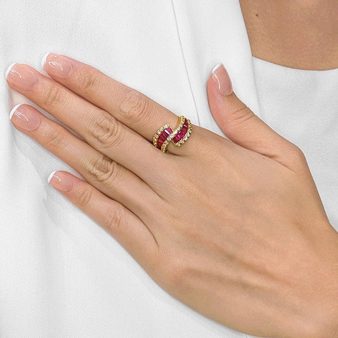 Expression audacieuse de l'élégance et de l'art, cette bague en or jaune 18 carats met en valeur 17 rubis taillés en pointe, totalisant 1,76 carat, dans une gracieuse formation en forme de vague. Leur teinte rose vif rayonne de chaleur et de