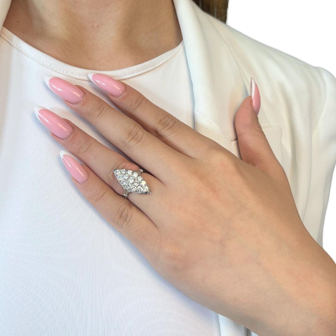 Sophisticated 2.60ct Diamonds Cocktail Ring in Platinum - IGI Certified

A symbol of timeless elegance, this platinum cocktail ring features 15 dazzling round diamonds (2.60ct), radiating brilliance from every angle. Set in the most luxurious metal,