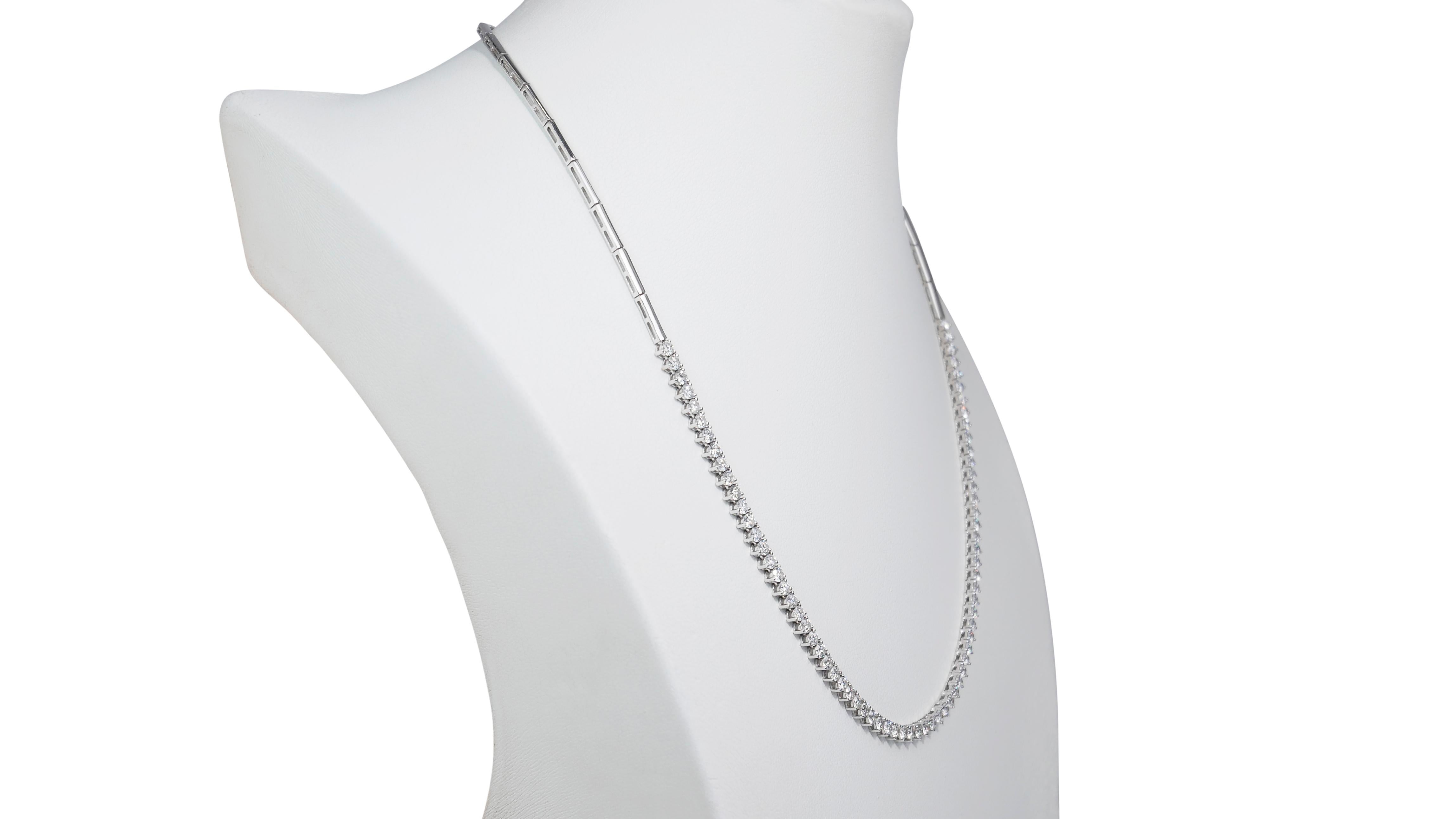 Sophisticated 4.63ct Diamonds Chain Necklace in 18k White Gold - IGI Certified

Adorn yourself with the timeless elegance of this 18k white gold chain necklace, featuring an impressive 4.63 carats of dazzling diamonds. The 72-round diamonds,