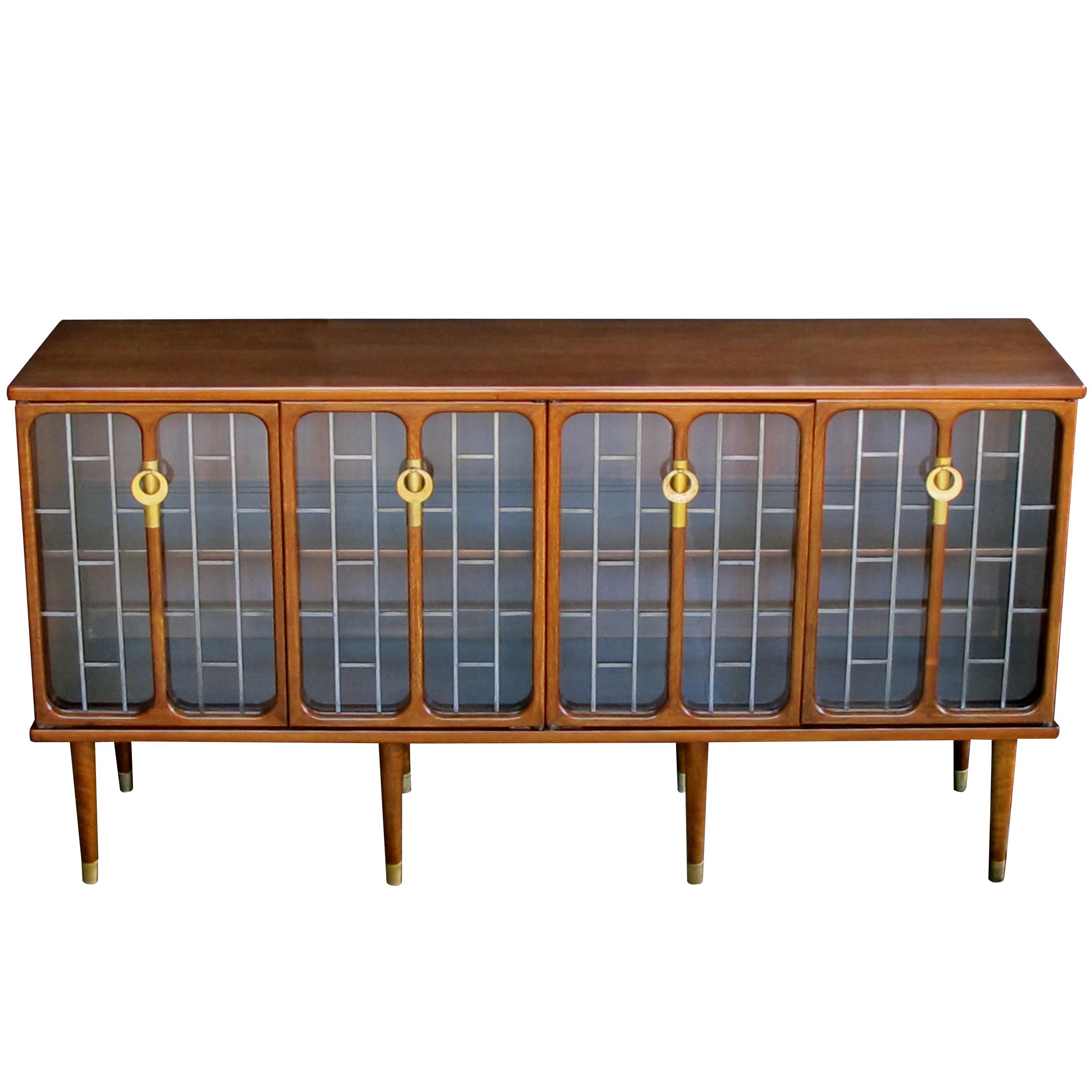 Sophisticated American Mid-Century Modern Walnut Four-Door Credenza or Sideboard