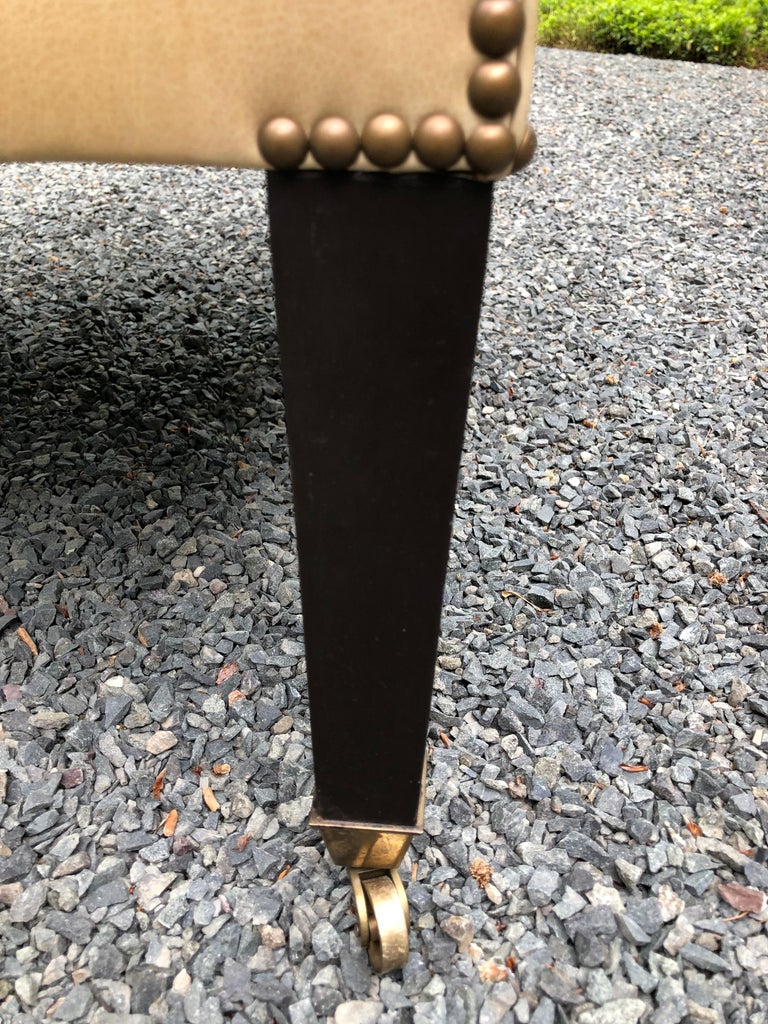 Sophisticated Camel Leather and Brass Nailhead Wingback Chair at