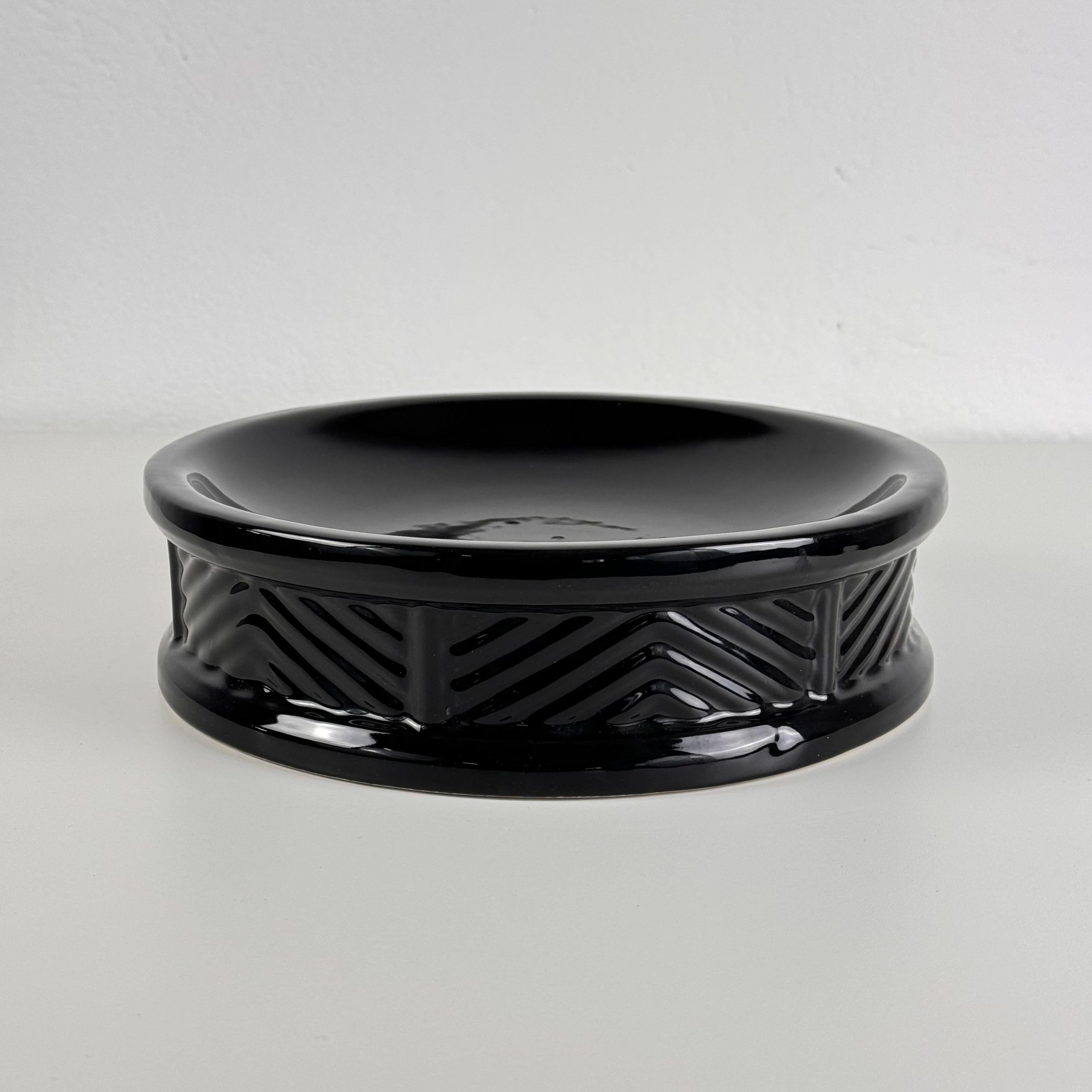 Elevate your decor with this stunning ceramic catchall or centerpiece by renowned Italian designer Tommaso Barbi, crafted in Rome during the 1970s. Despite its era of creation, this piece exudes a timeless Art Deco-inspired elegance, reflecting