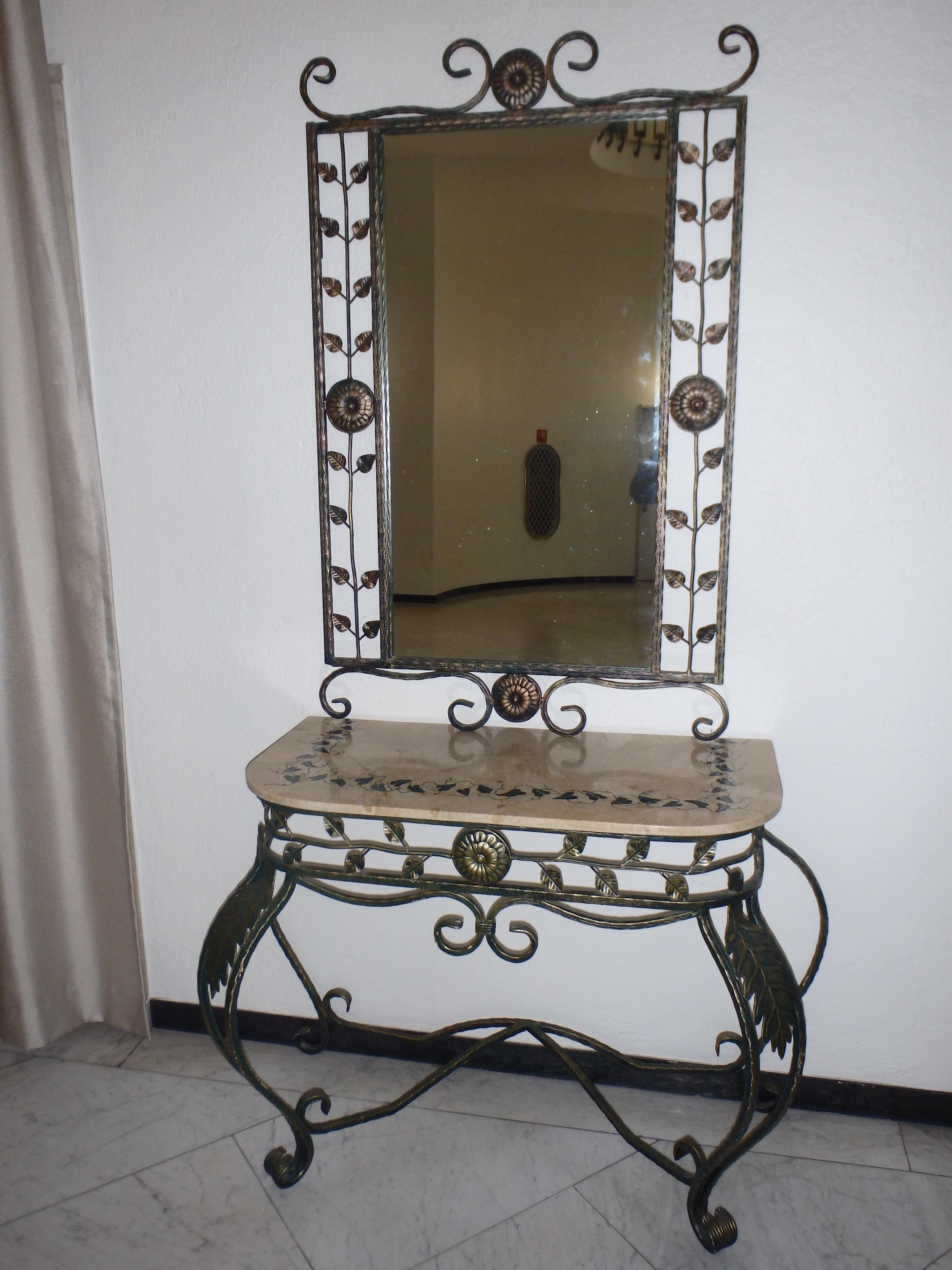 Sophisticated console with beige marble top with real inlay leafs and matching mirror.
