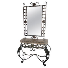Sophistiquée console avec plateau en marbre beige incrusté de feuilles et miroir assorti