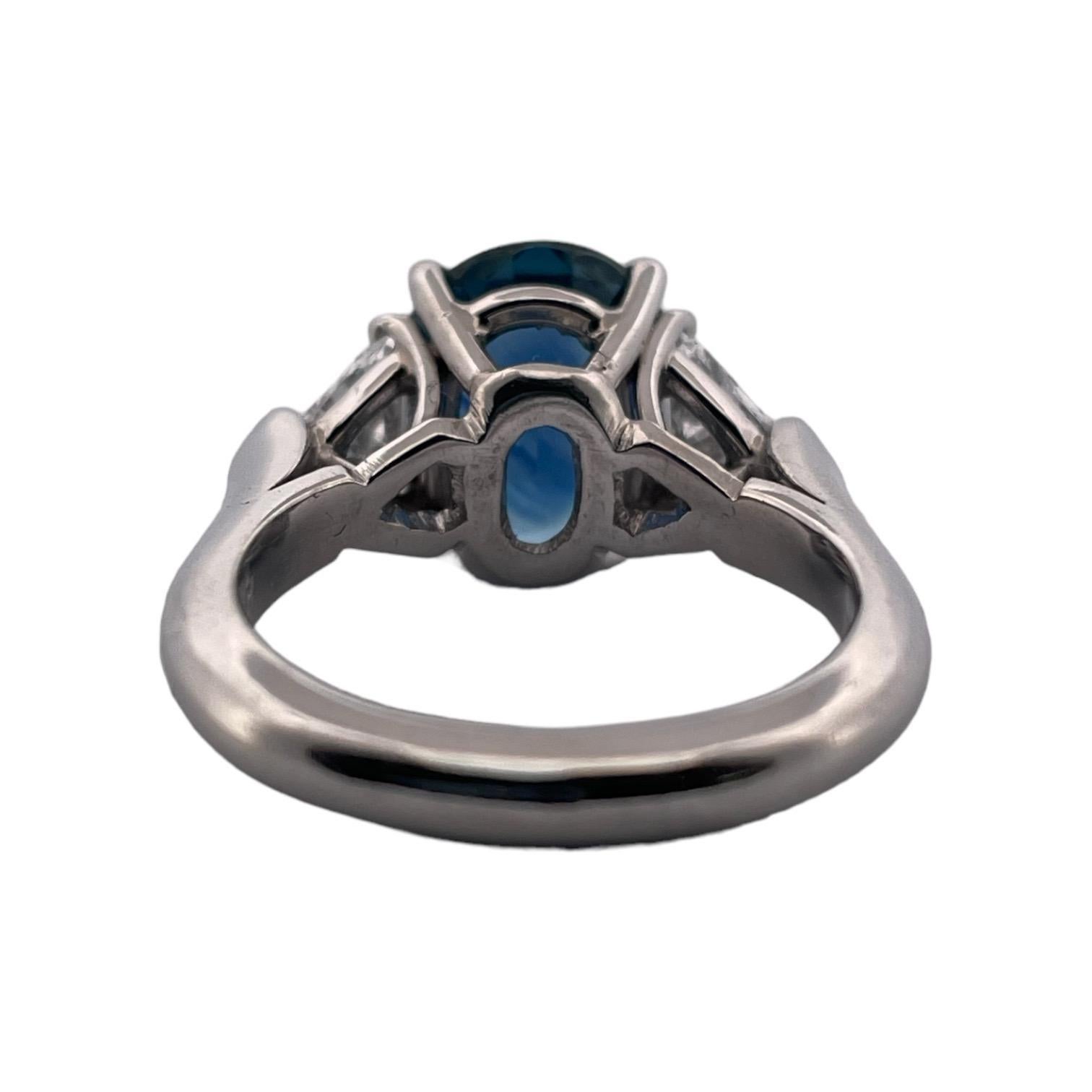 Modern Sophisticated Cylon Sapphire and Natural Diamond Platinum Ring For Sale