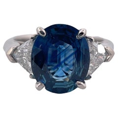 Sophisticated Cylon Sapphire and Natural Diamond Platinum Ring