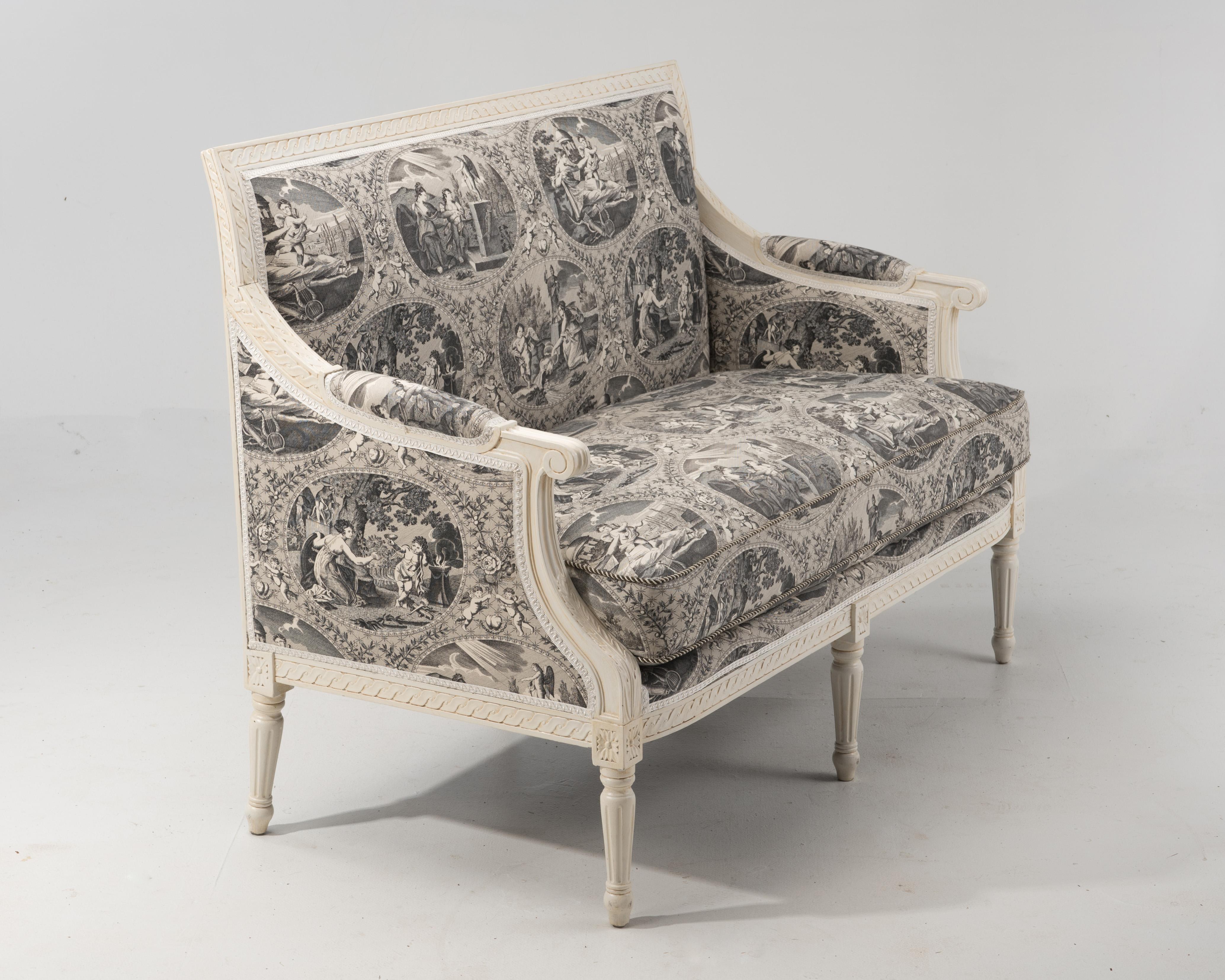 Lovely loveseat elegantly carved and painted cream in the Louis XVI style, recently upholstered in black and white toile, with a comfy down removable seat cushion.
Measures: Seat height 19
Seat depth 21
Arm height 26.5.