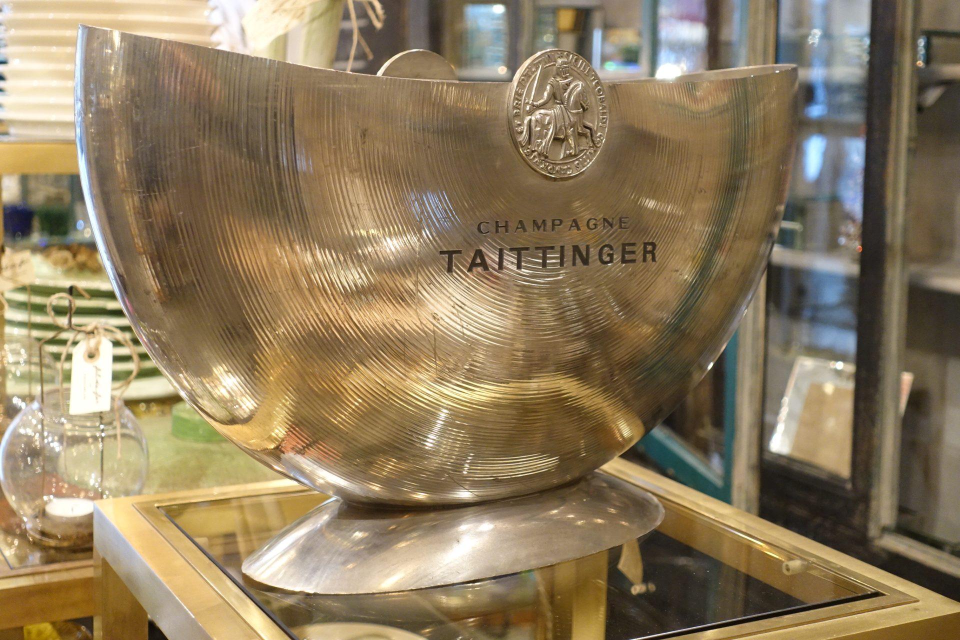 Gorgeous and sophisticated half moon champagne / wine ice bucket, by Taittinger. Wonderful shape. This elegant large double cooler has been designed to hold 2-3 bottles. Produced in tin and shined up, by the renowned metal work business l’Orfèvrerie