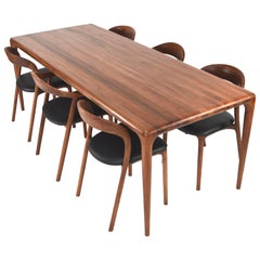 Ensemble de salle à manger sophistiqué, fabriqué à la main, en noyer massif et cuir