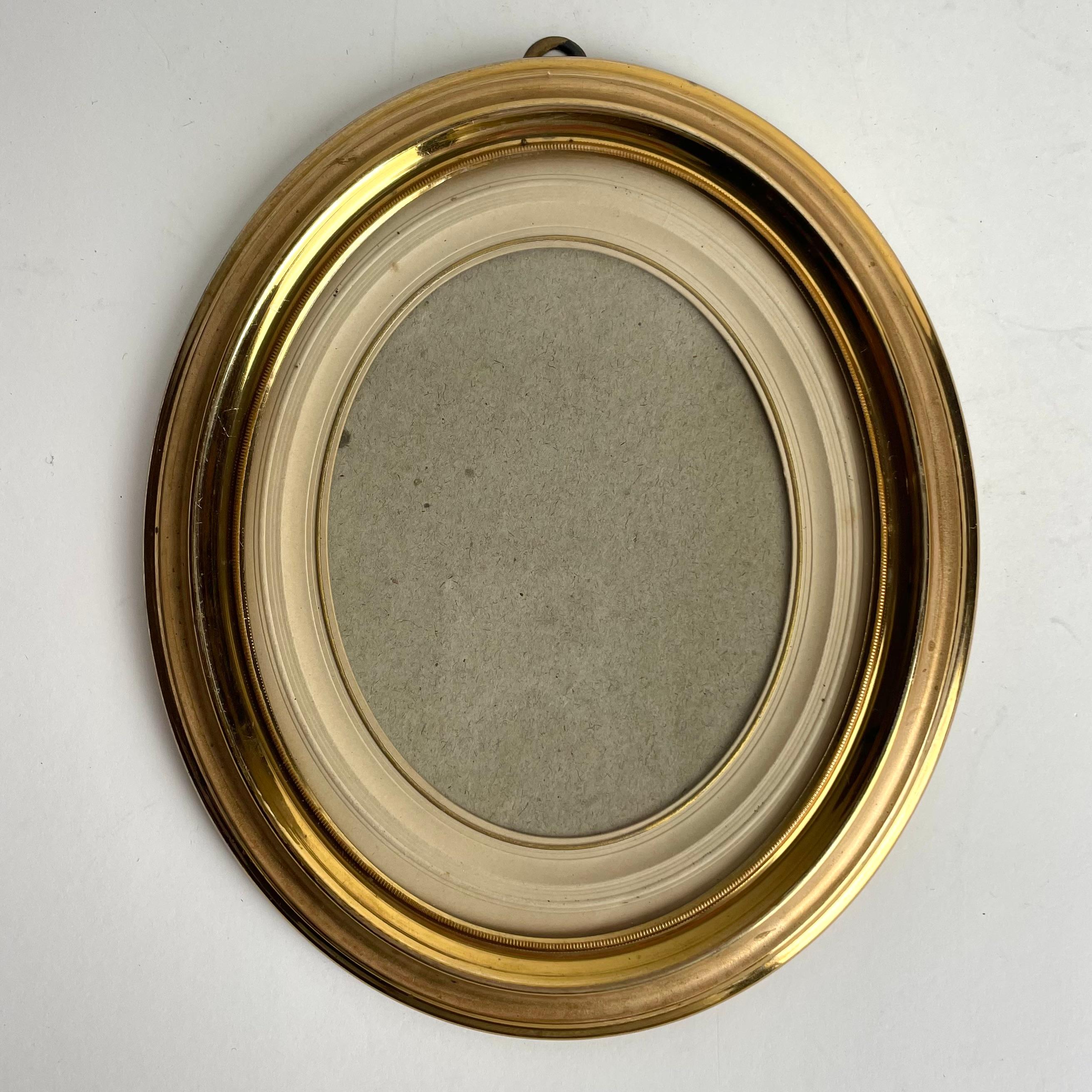 Sophisticated late 19th gilt and matte brass wall Photo Frame. Simple and beautiful design of high quality.

Wear consistent with age and use 