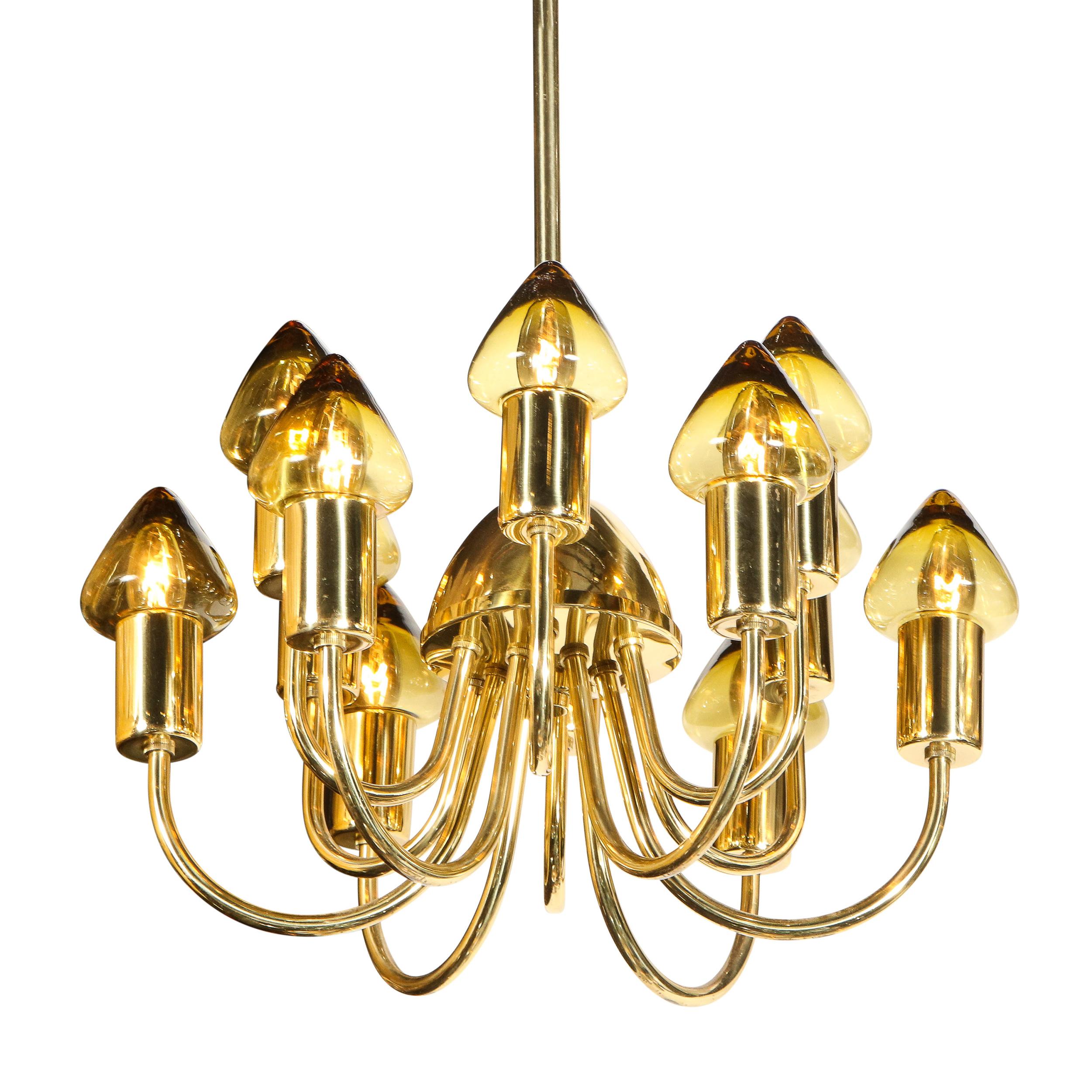 This refined Scandinavian Mid-Century Modern chandelier was realized circa 1960 by the celebrated Swedish designer Hans-Agne Jakobsson. Active between 1950 and roughly 1970, often considered the 