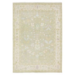 Sophisticated Modern Oushak Wool Rug – Muted Sage & Pastel Floral Design