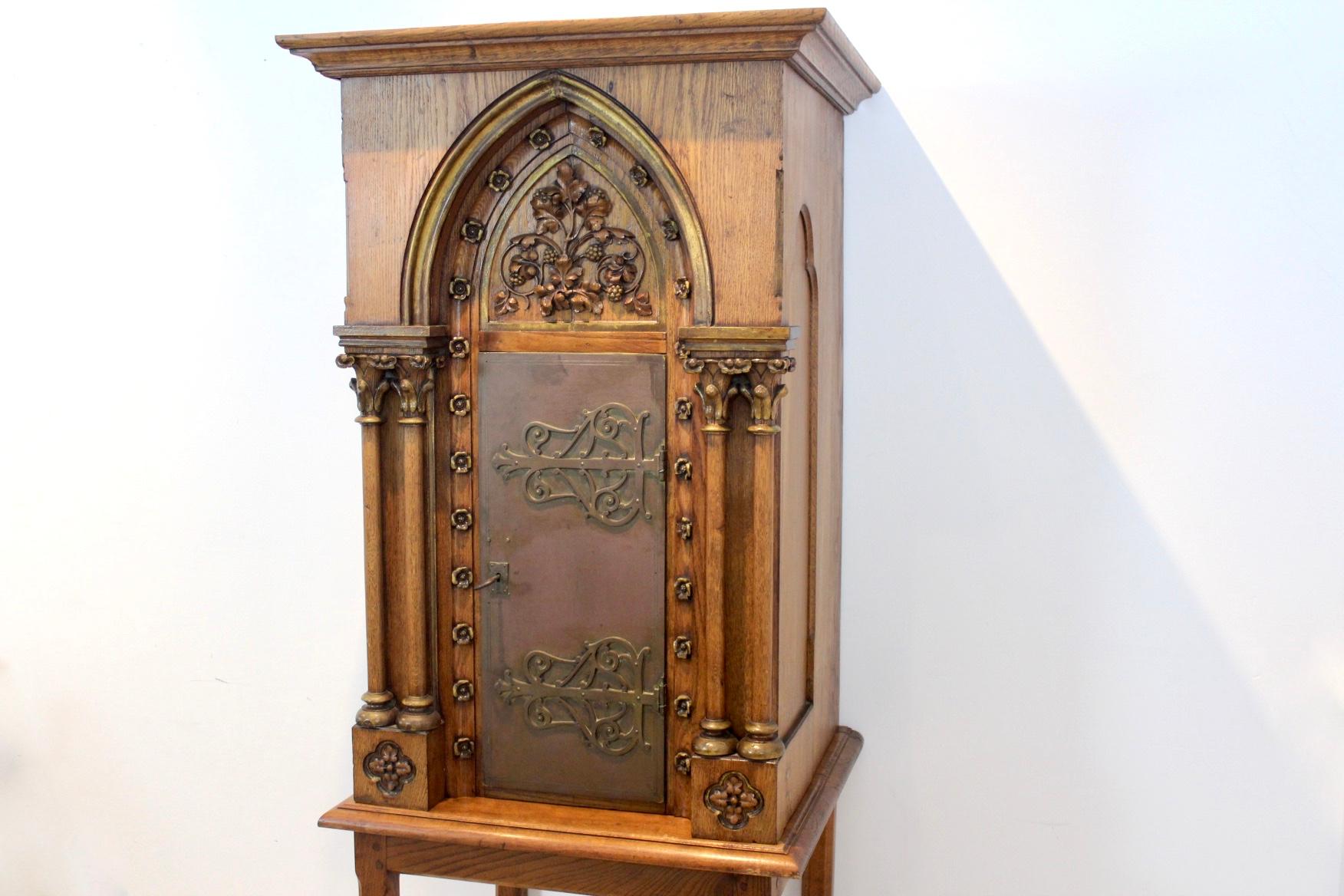 Sophisticated, respected and solid Tabernacle remaining from a Church. Completely made in oak, only the door is made of solid steel. A tabernacle is a fixed, locked box or cabinet in which, in some Christian churches, the Eucharist was 