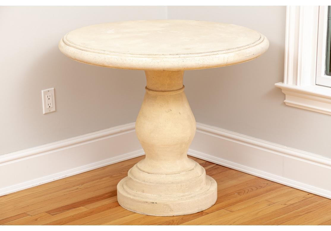 A Natural Style pair of Cast Stone Pedestal Tables with an elegant silhouette with a 35