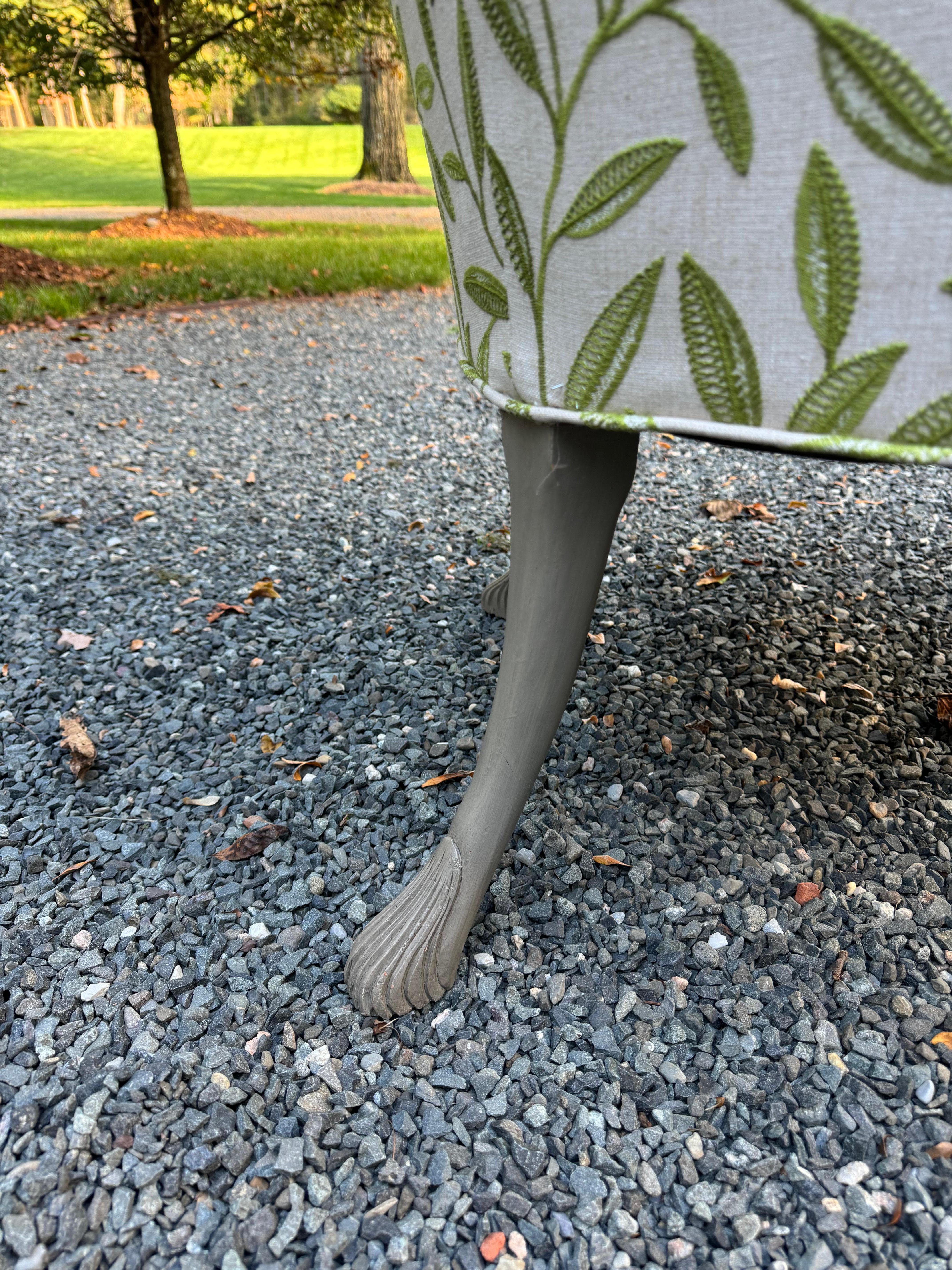 Sophisticated pair of upholstered armchairs having nicely carved and finished legs and new leaf pattern cotton fabric.  The leaves are spring green on a pale 