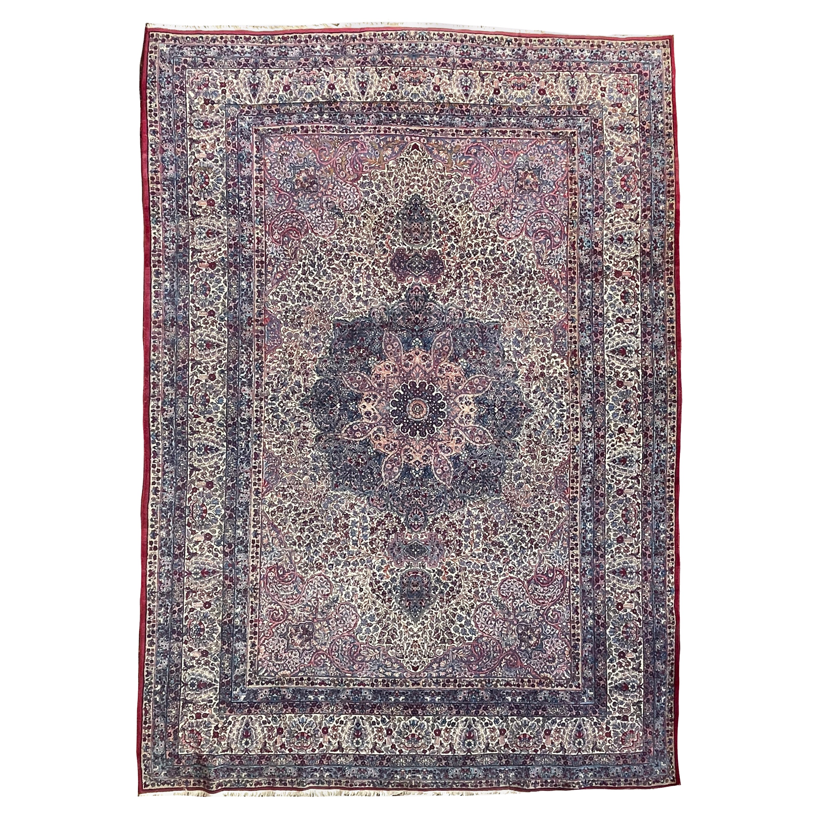Tapis ancien botanique pastel sophistiqué, vers les années 1930