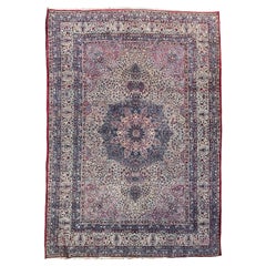 Tapis ancien botanique pastel sophistiqué, vers les années 1930