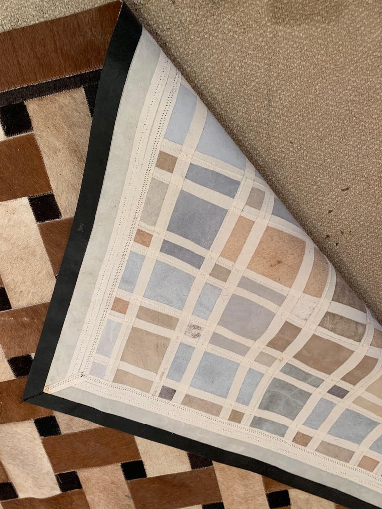 Sophisticated Patchwork Cowhide Area Rug For Sale at 1stDibs