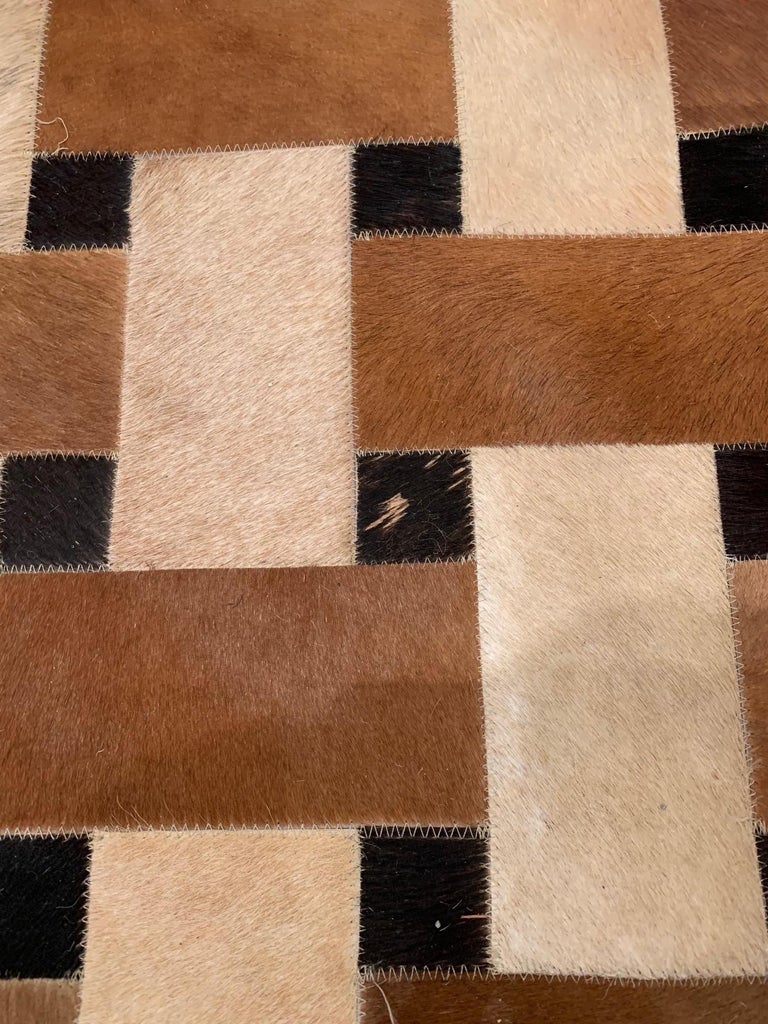 Sophisticated Patchwork Cowhide Area Rug For Sale at 1stDibs