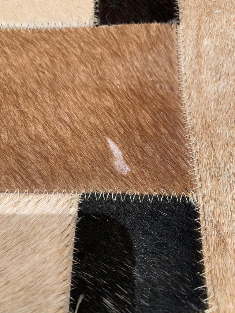 Sophisticated Patchwork Cowhide Area Rug For Sale at 1stDibs