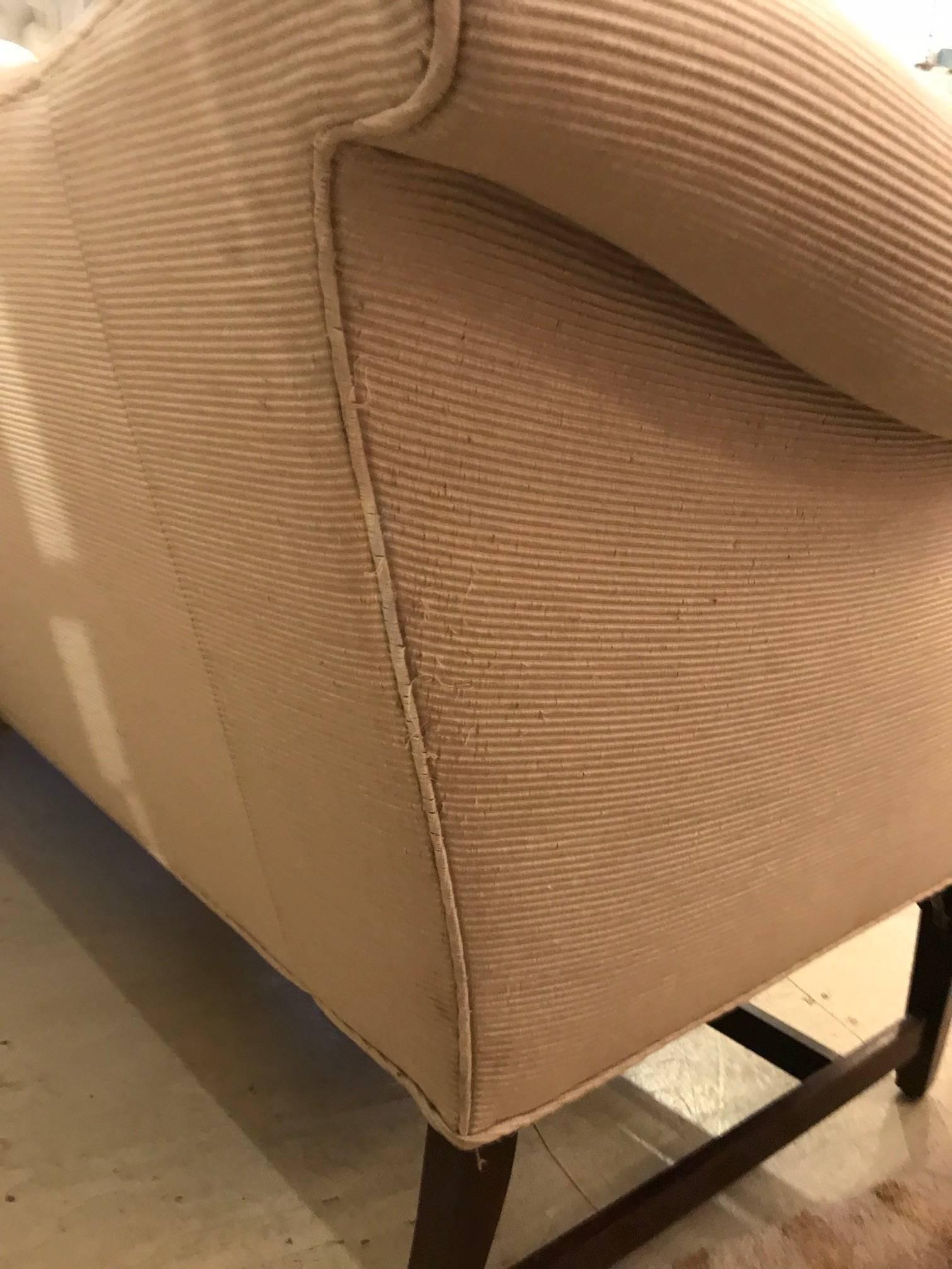 Sophisticated Tailored Camel Back Sofa 2