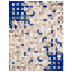Alfombra de piel de vaca azul enrejada, sofisticada y clásica Pequeña