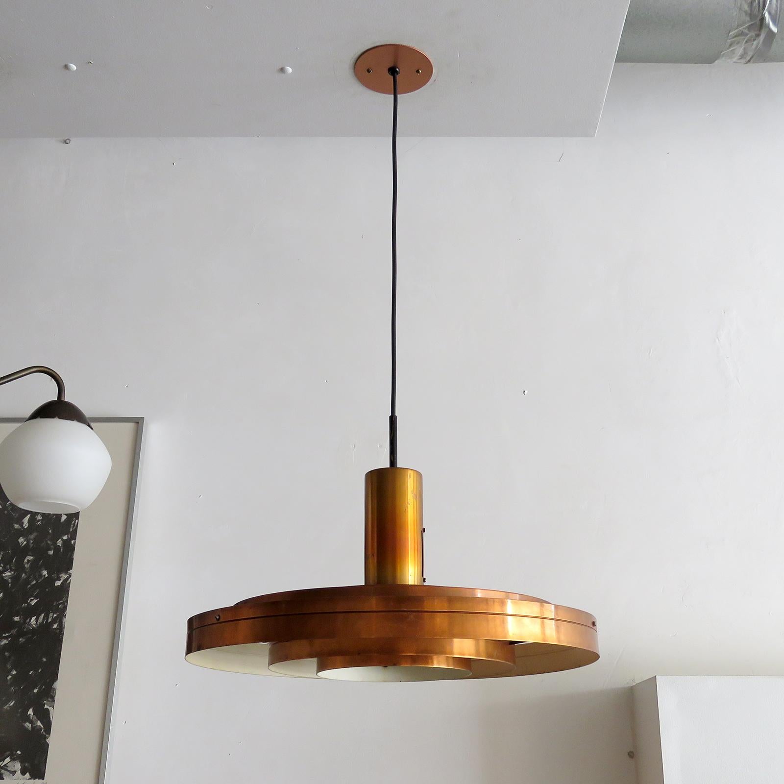 Wonderful model 'Fibonacci' copper pendants by Sophus Frandsen for Fog & Mørup, 1960, made of concentric copper bands, designed in 1960, wired for US standards, one E27 socket, max. wattage 75w each or LED equivalent, bulb provided as a onetime