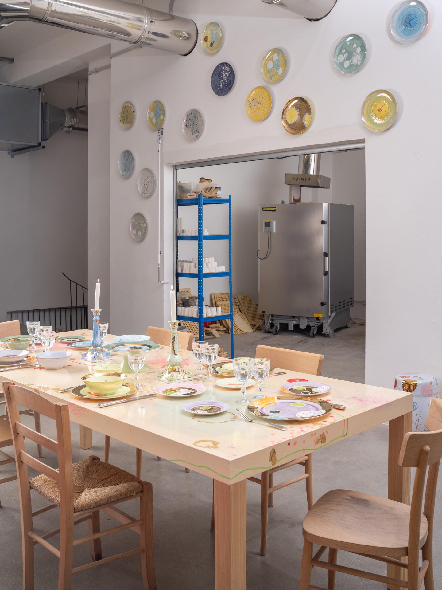 The Gold Impressions collection takes Coralla's exploration of geometry and minimalism to a new dimension, infusing her iconic designs with radiant gold accents. These golden elements transform familiar symbols, like the Mountain, into luminous