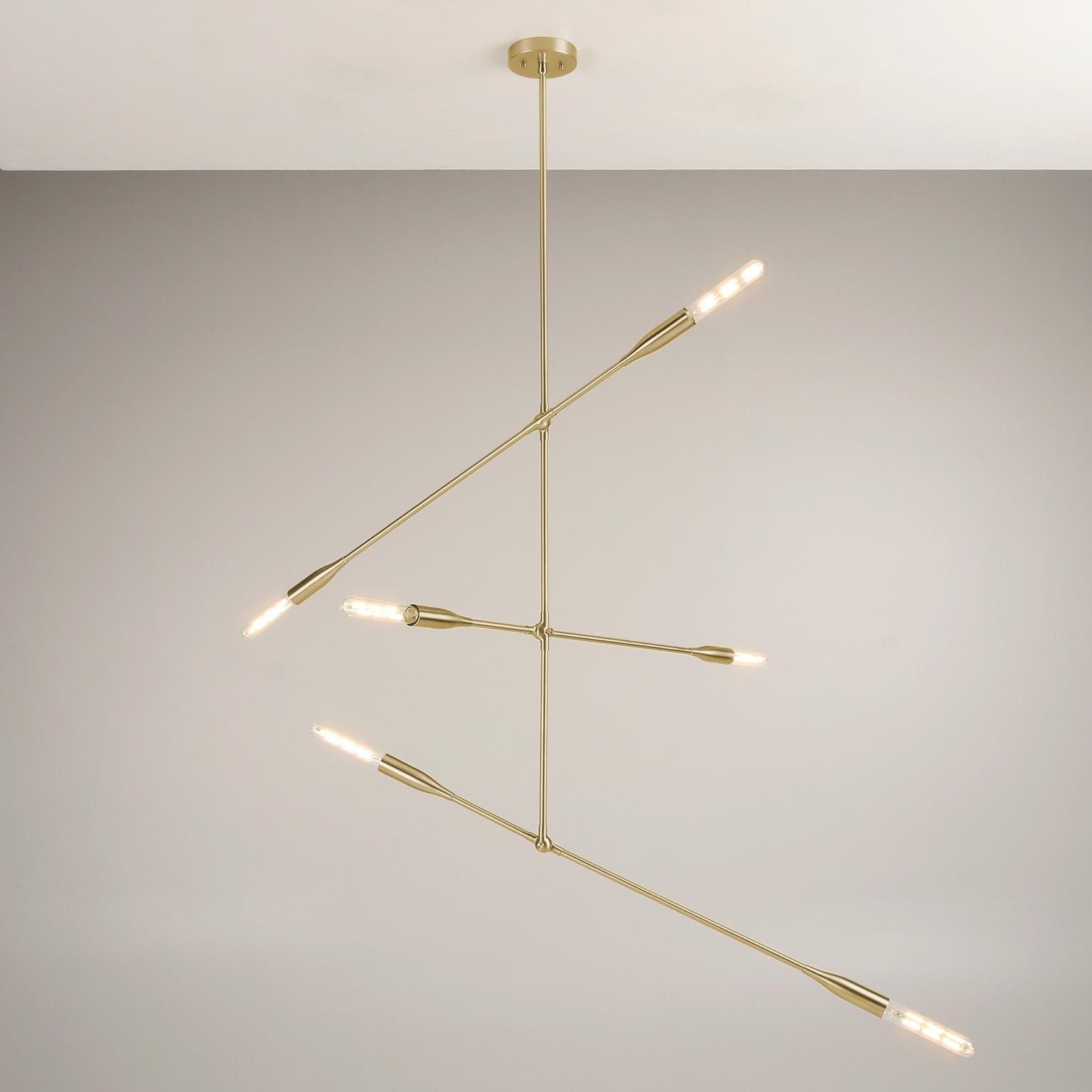 The Sorenthia 3-Arm is a modern, linear pendant with bold, elegant lines and dramatic negative space. The custom-made light fixture incorporates an element of the organic in its design language with long, reaching arms that can be adjusted on site,